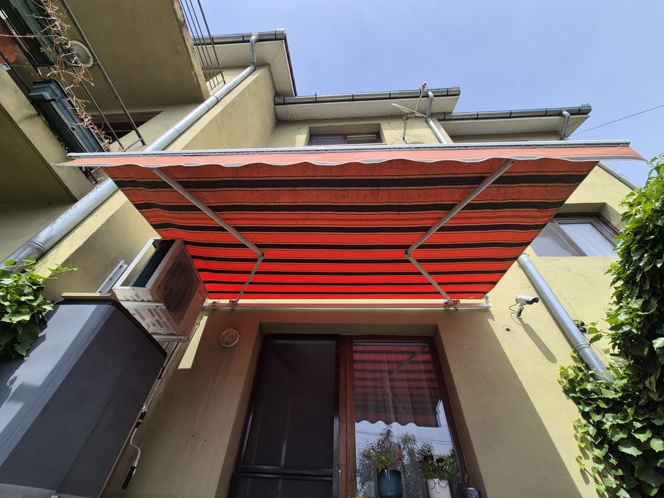 Copertină retractabilă