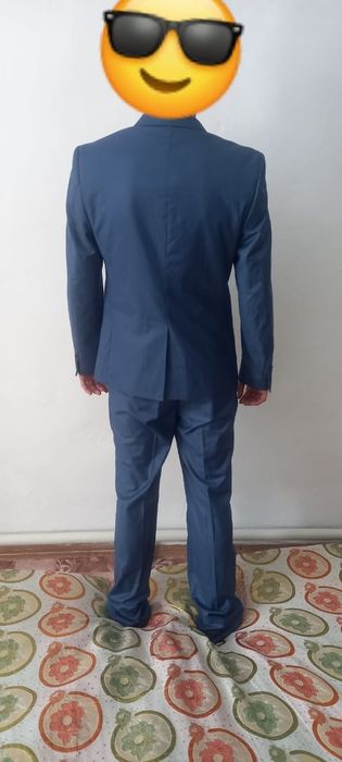 Продам новый костюм