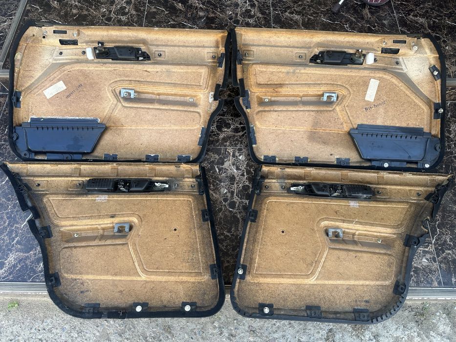 Дверные карты - обшивки Е34