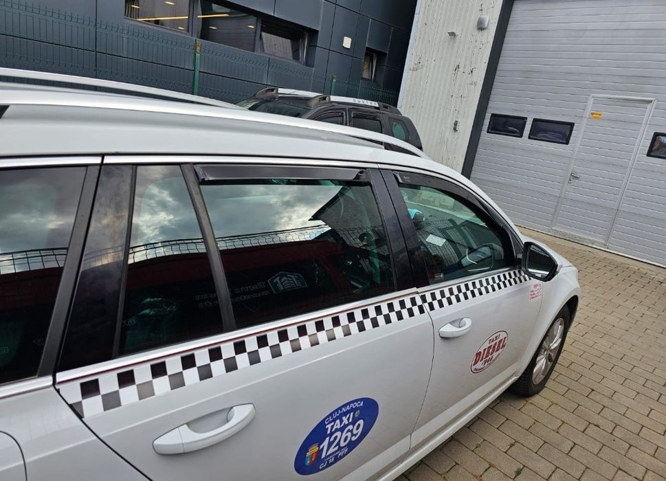 Cesionez autorizatie taxi cu mașină Skoda Octavia an 2017
