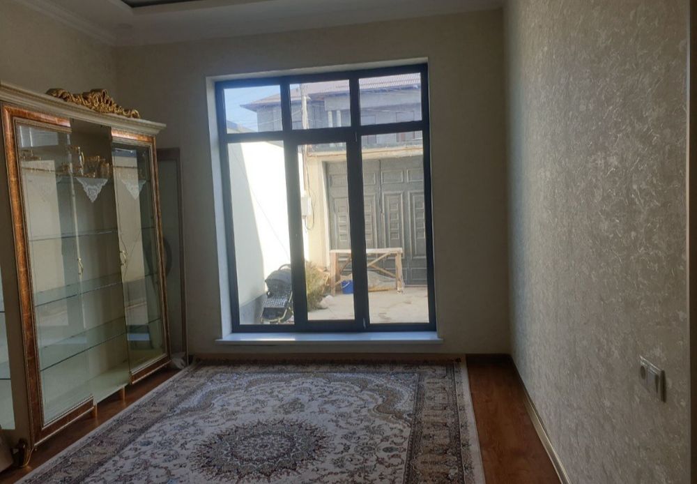 Xasanboy postdan 900 metr kirganda 1.35 sotu 4 xona 2 etajli kattedj