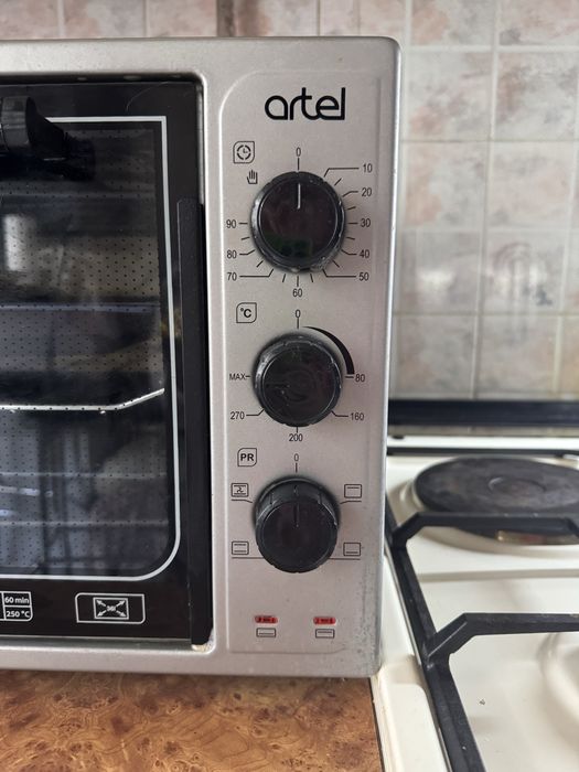 Продам мини электропечь Artel