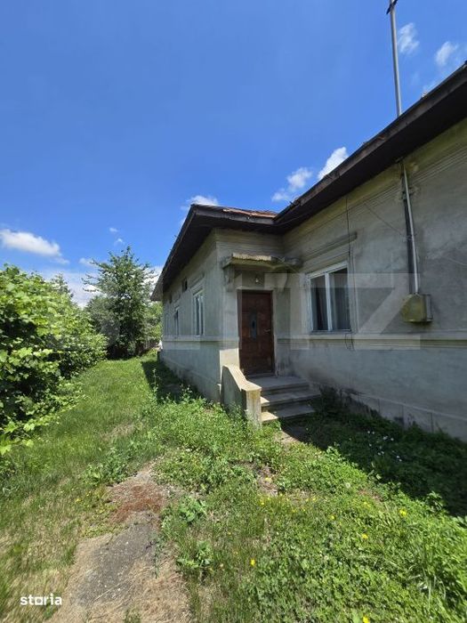 Casa 65 mp, teren de 1.500 mp, zona Titu