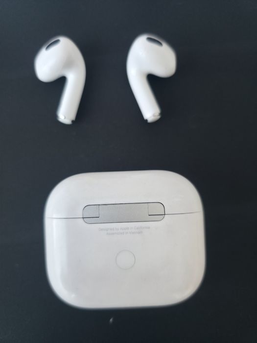 Vând căști Apple