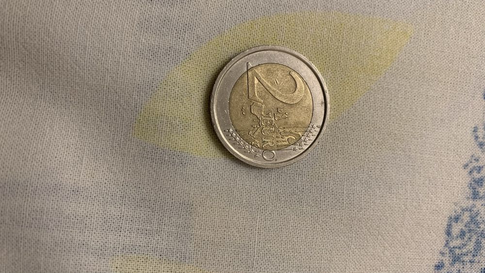 Монеты 2 и 1 евро