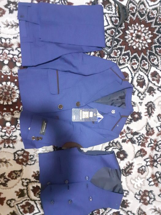 Костюм шим сотилади