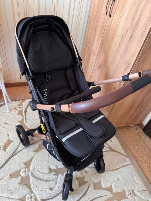 Детская прогулочная коляска