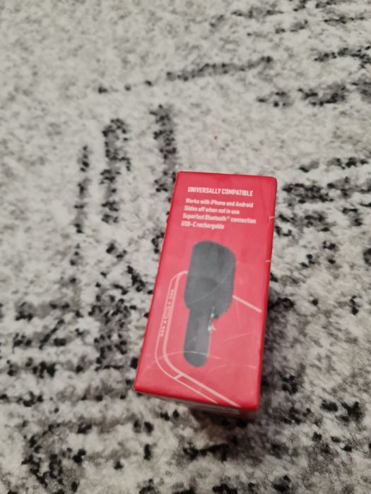 G-Grip - buton pentru poze