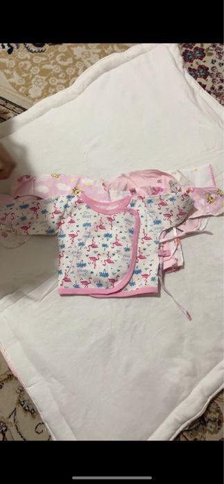 Одежды для новорожденных