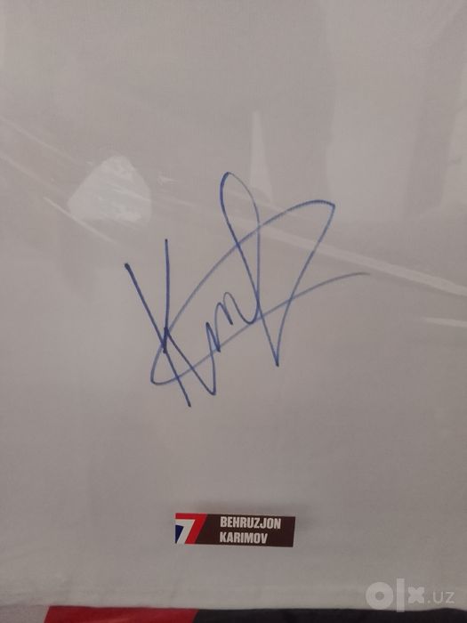 Futbolka Behruzjon Karimov imzosi bilan