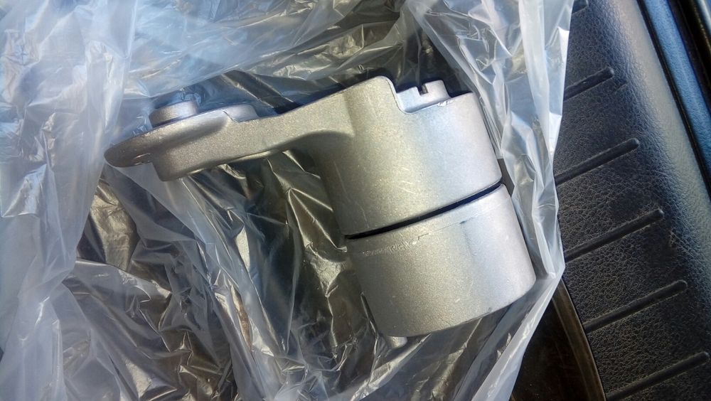 Натяжитель ремня