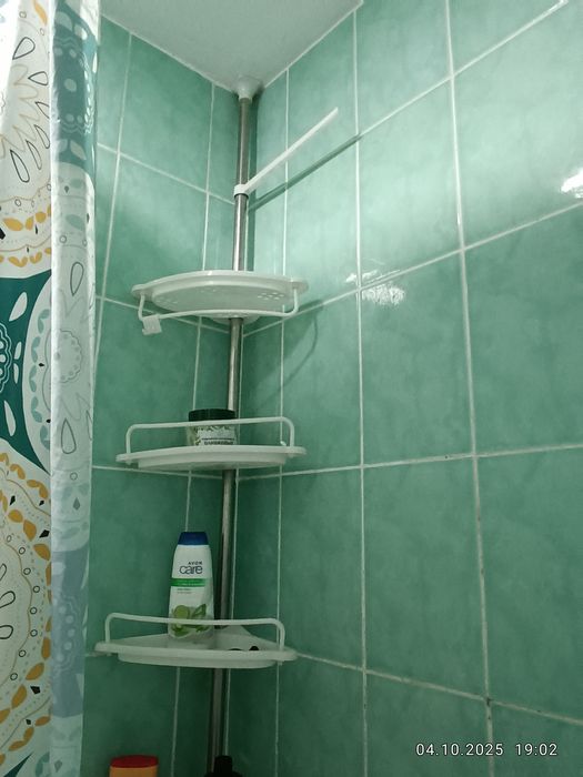 Телескопическая полка для ванной