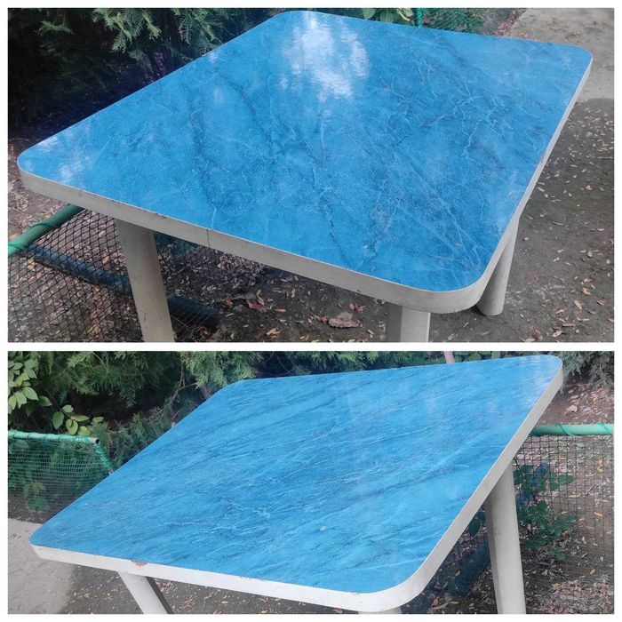 Стол для кухни покрыт синим пластиком
