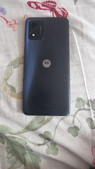 Моторола е 13 телефона е  нов