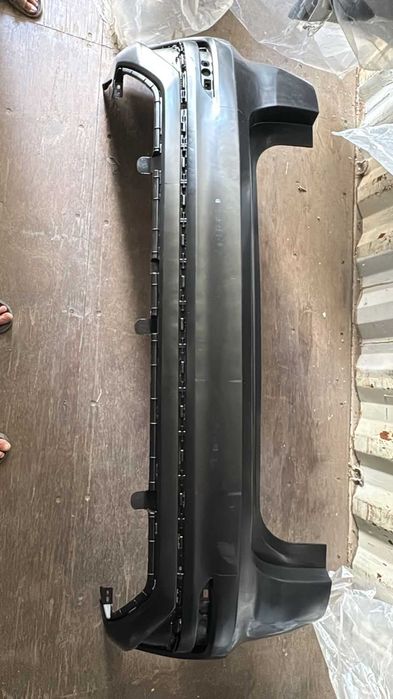 Бампер задний на Джили Эмгранд 2022 - / Geely Emgrand 2022 -