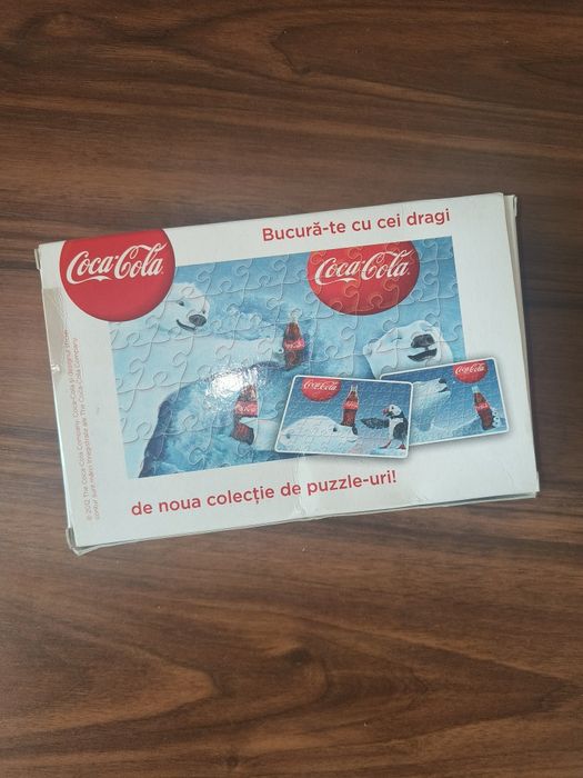 Vând puzzle coca cola