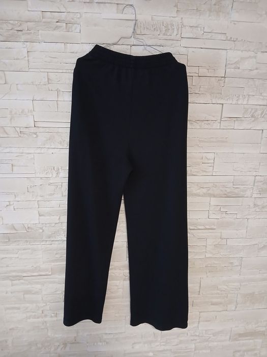 Pantaloni Zara evazati cu fermoar pe lateral jos