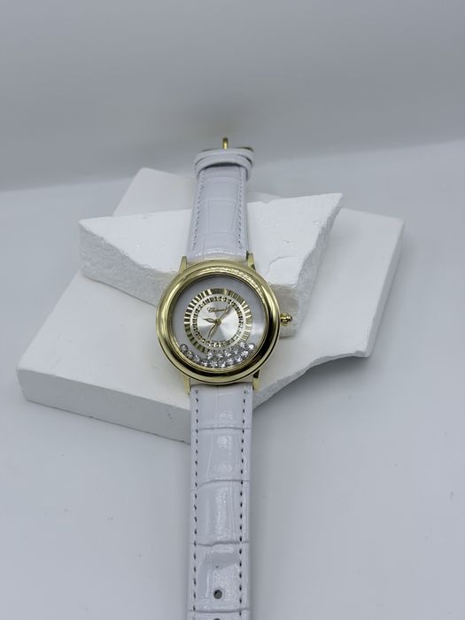 Женские золотые часы Chopard