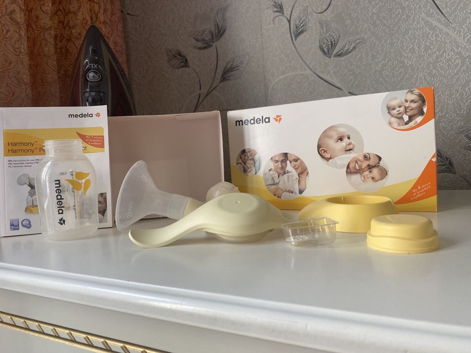 Молокоотсос Medela