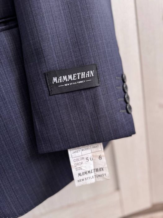 Костюм новый 50 размер