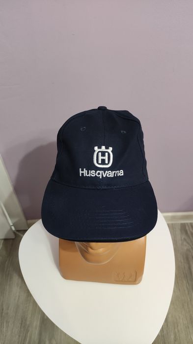 Нова шапка Husqvarna