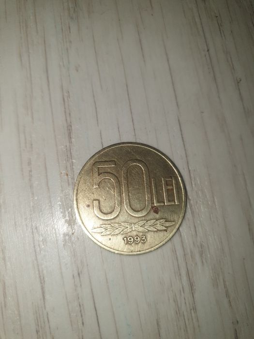 Vând moneda 50lei 1993 am și de 20 lei dar pt ceea ce vedeți în poze