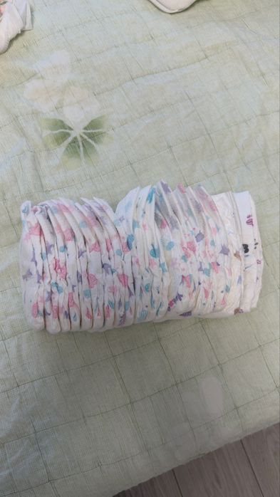 Подгузники мама знает