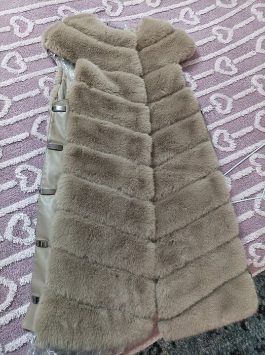 Продам срочно жилет из меха