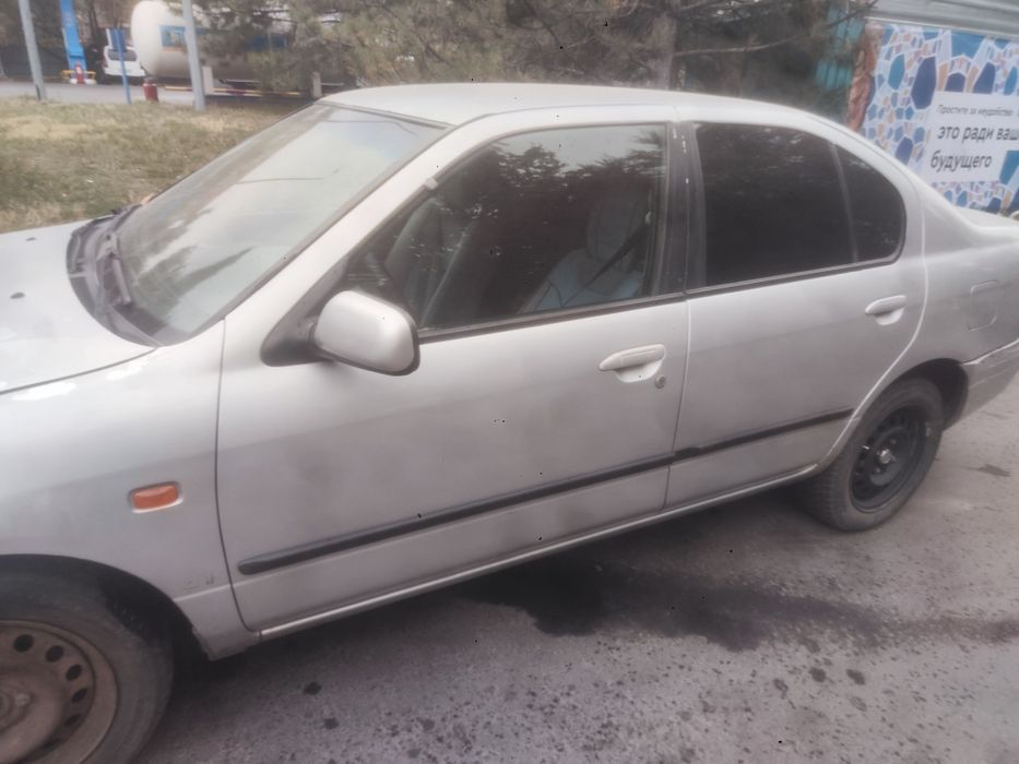 Ниссан примера 1998 ж 2.0