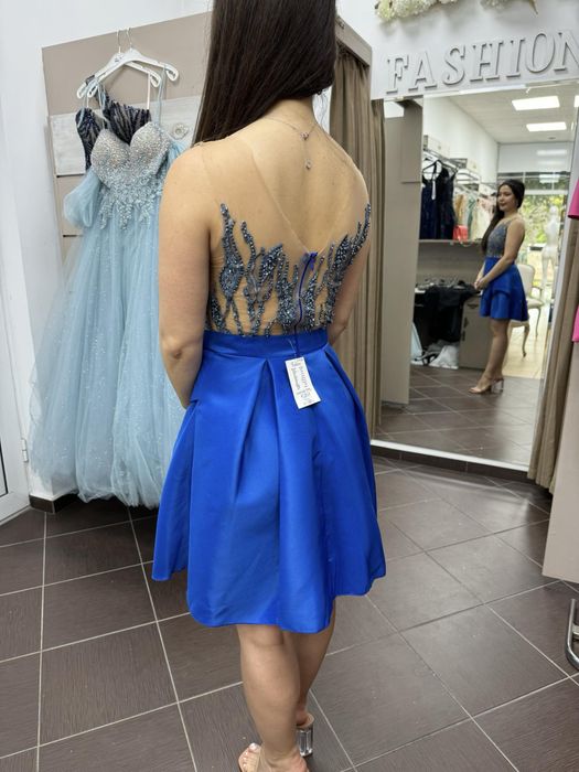 Елегантна дизайнерска рокля