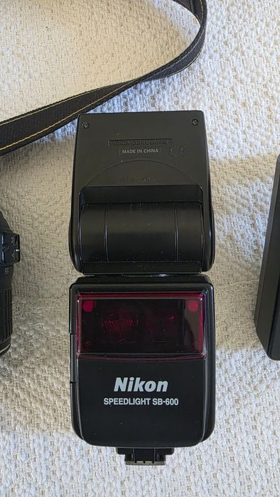 Nikon D3100 – Kit complet, stare foarte bună, doar ~20.600 cadre
