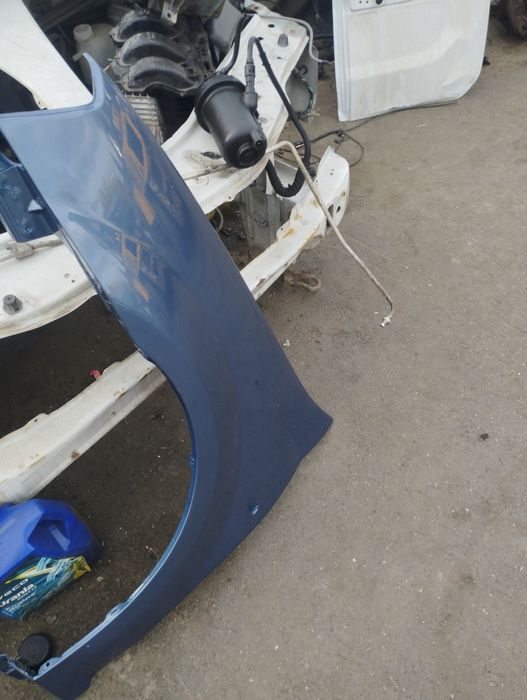 Aripa stângă far stânga Dacia Logan 1