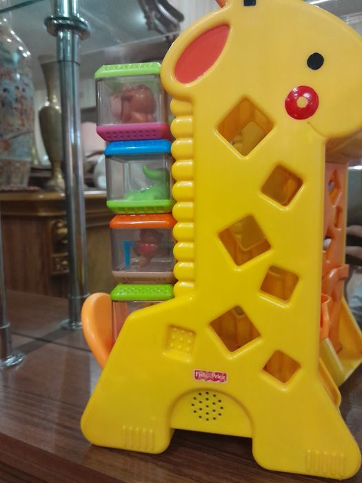 Продам игрушку жирафика