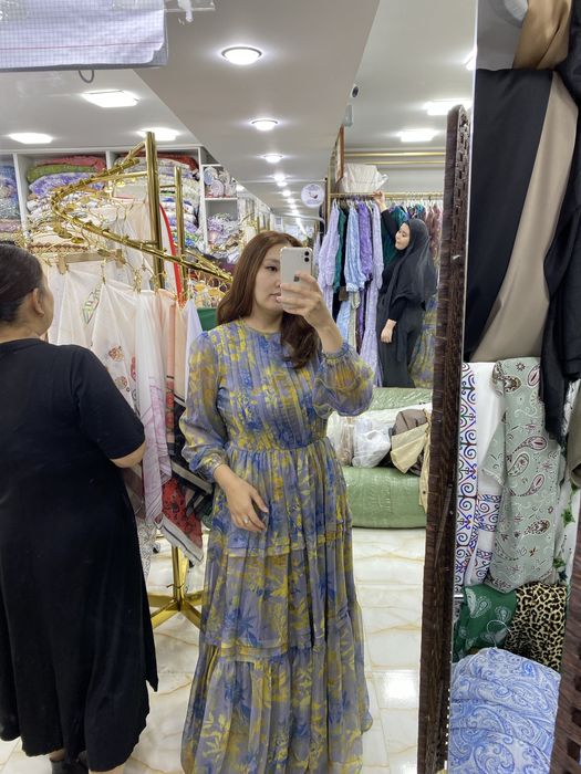 Платья вечерние пальто.