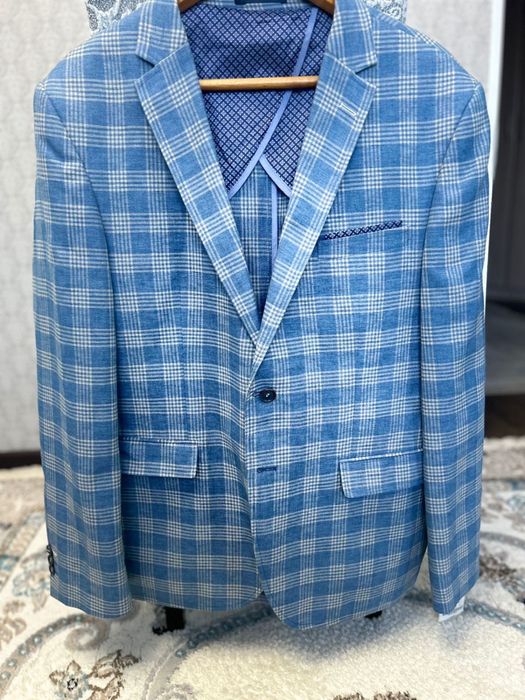 Пиджак в клетку новый