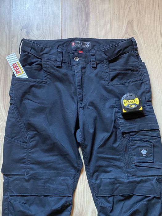Pantaloni de lucru pentru bărbați Engelbert Strauss, culoare neagră, mărimea 52. Model cu multe buzunare. În stare foarte bună.