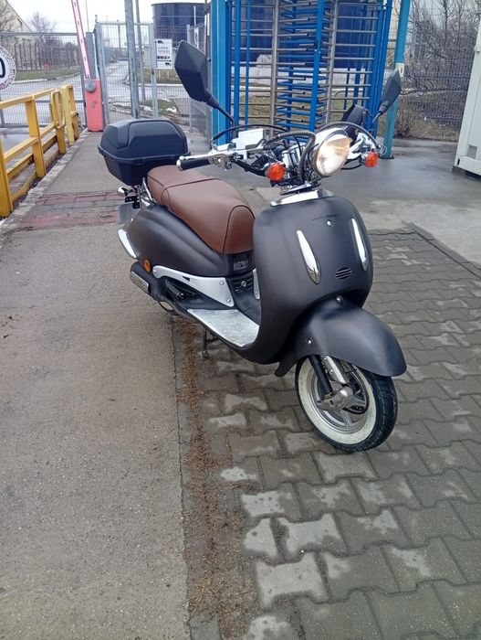 Schimb cu scuter de 125