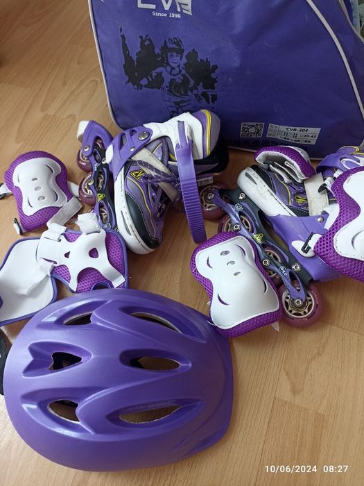 Роликовые коньки