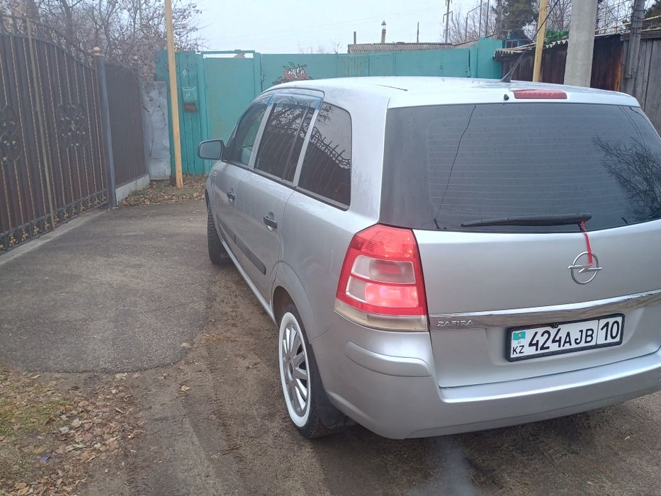 7 мест Опель Зафира
