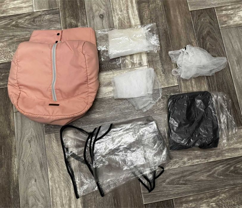 Коляска для девочки розовая