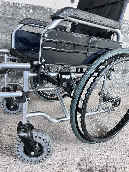 Коляска для инвалидных