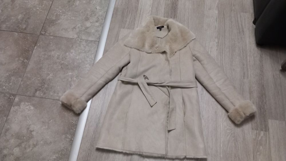 Дамско пухено палто