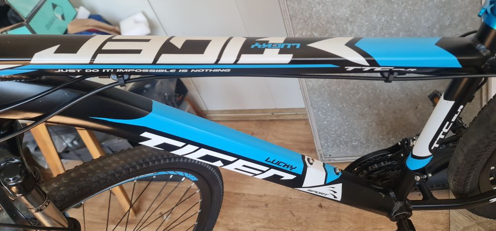 Bicicletă Tiger cadru aluminiu tare impecabilă roți pe 29 frână disc față spate impecabilă