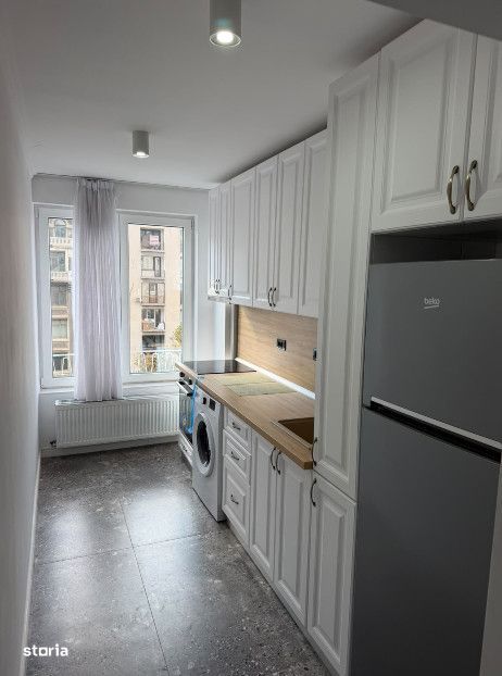 Apartament 2 camere| 2' metrou P-ta Romana| Centrala proprie|