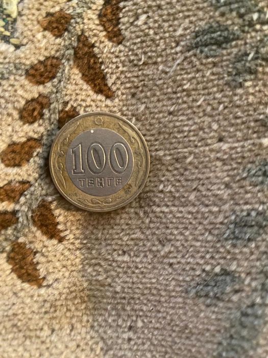 Продаю монеты наименование 100 ТГ Юбилейные