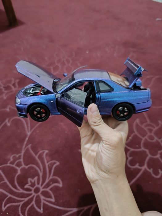 NISSAN SKYLINE 34 1:24 holati yangi