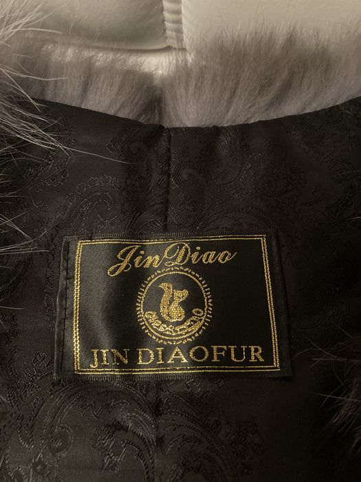 Меховая жилетка