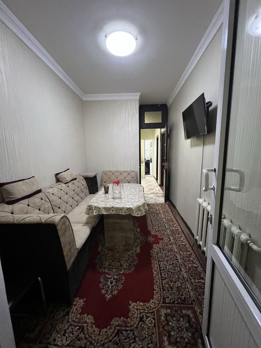 Продаётся квартира Юнусабад18 2 ком 1 этаж кирпичный дом 77 серия