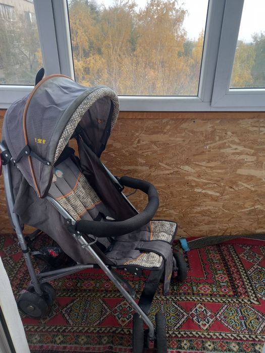 Детская прогулочная коляска