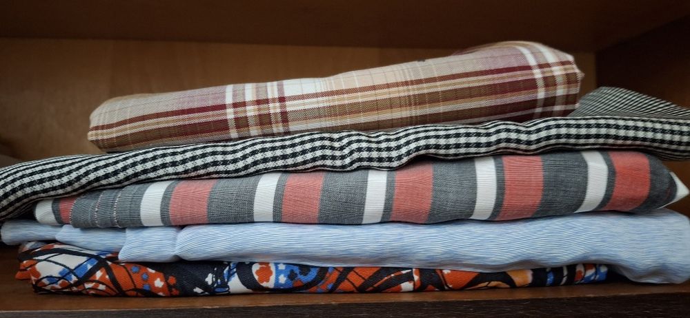 Отрезы тканей различных размеров тканей